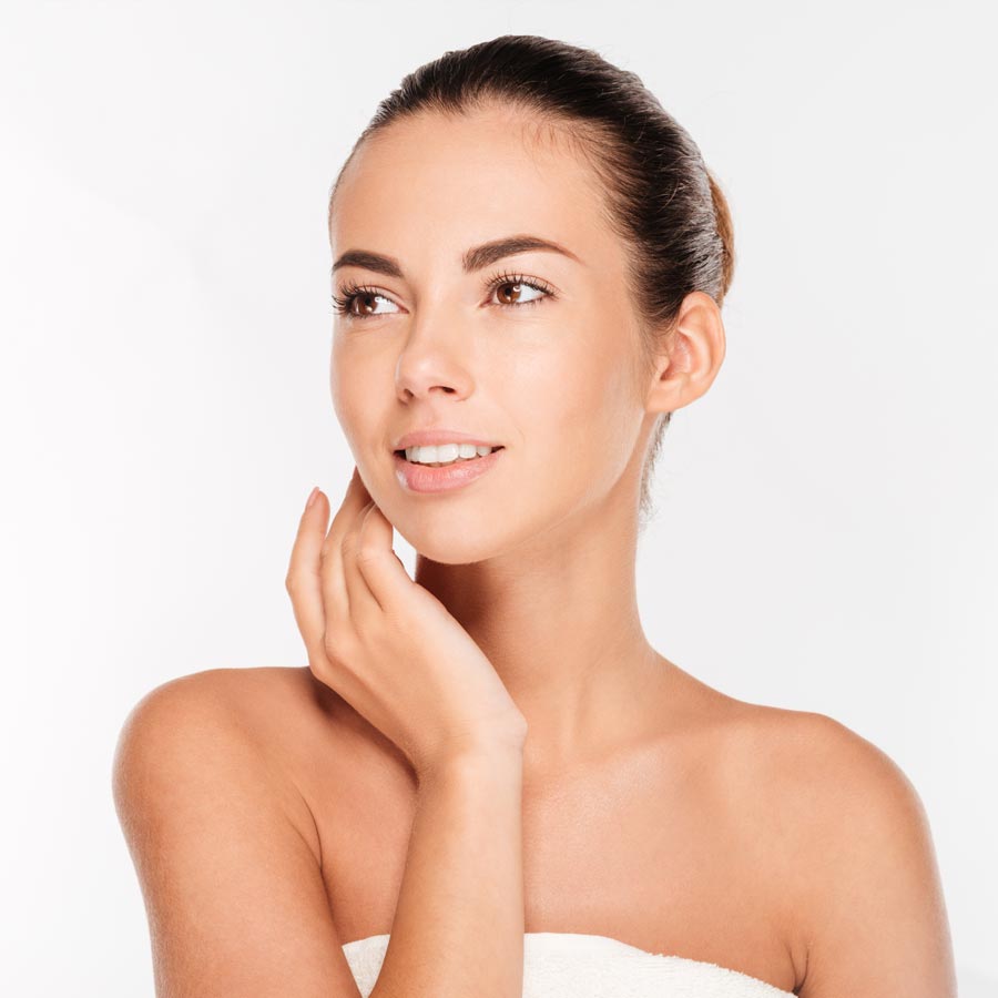 Beauty portrait of a woman with fresh skin looking away